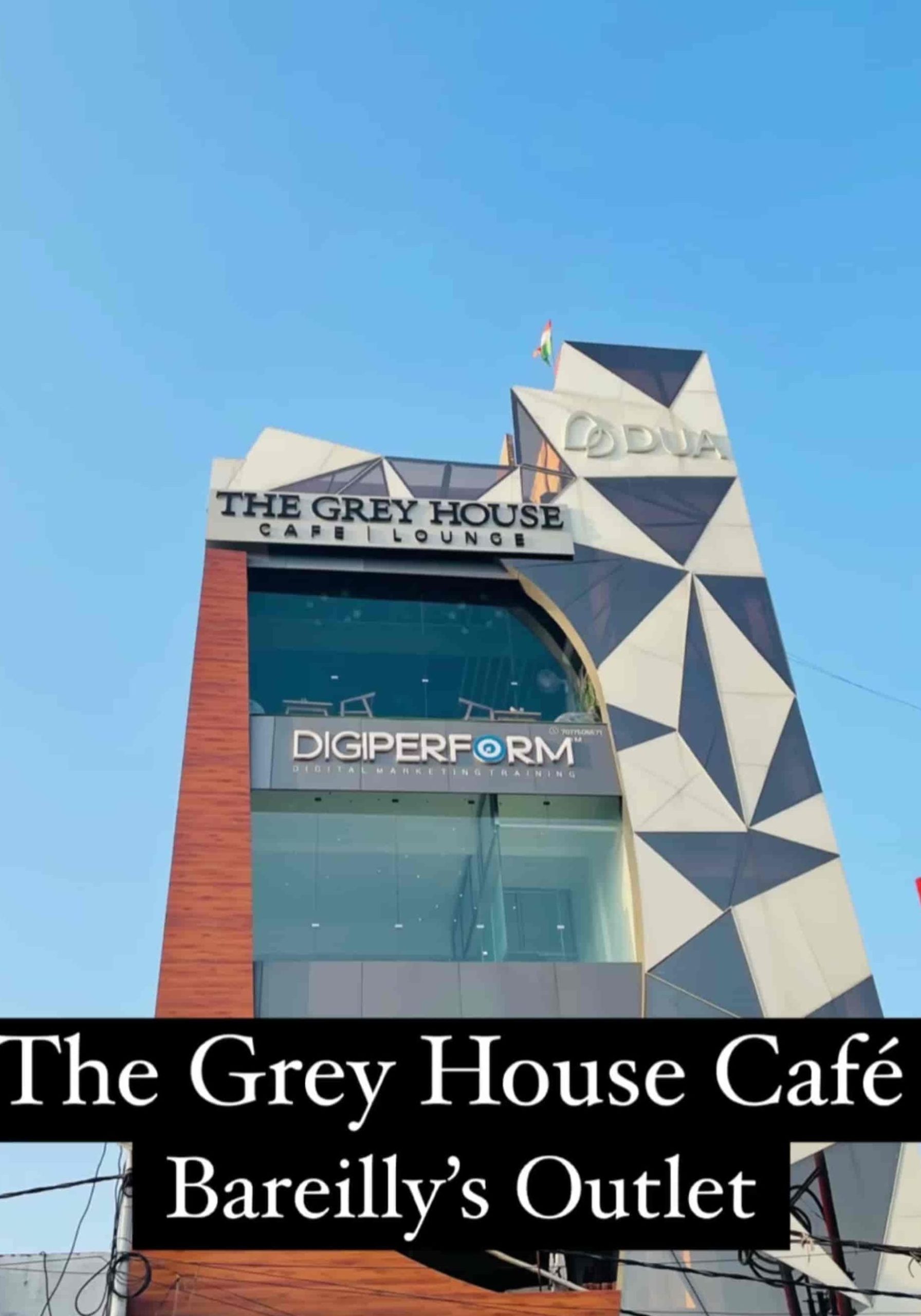 the grey house cafe terrace lounge grey courtyard scaled